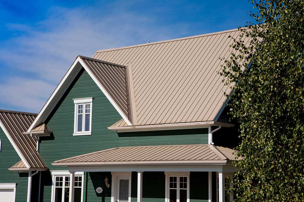 green house with metal roof